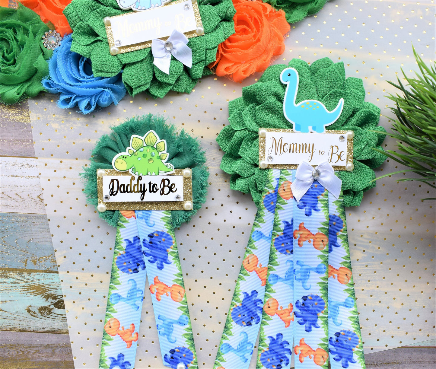 Dinosaur Baby Shower, Dinosaur Corsage Pin Set, Dinosaur Mommy to Be Sash, Dinosaur Mommy Daddy to Be, Dinosaur Orange Green Blue, Custom - Celebrations By Cris