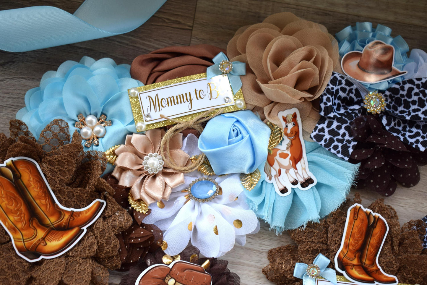 Blue Cowboy Baby Shower, Blue Cowboy Maternity Sash, Boy Cowboy Mommy and Daddy To Be Pin, Blue Brown Flower Sash, Blue Boot Hat Corsage Pin - Celebrations By Cris